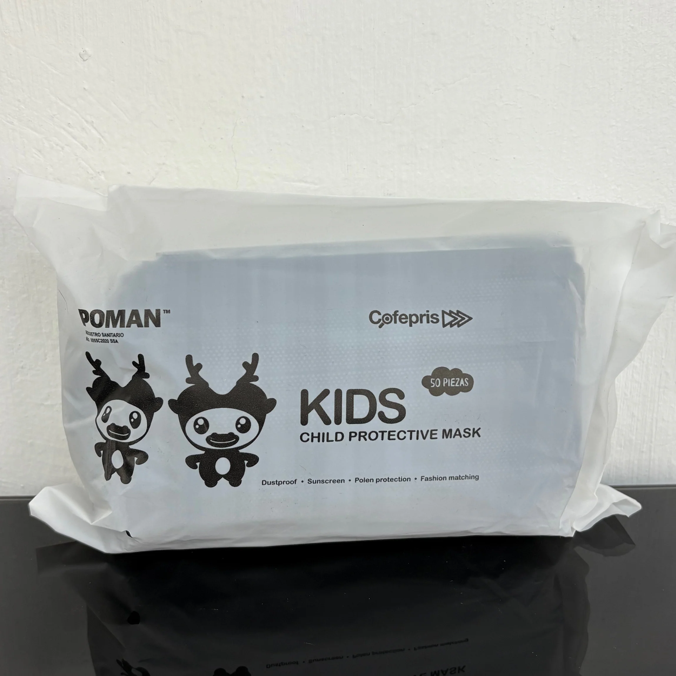 Cubrebocas Triple capa Poman niño negro